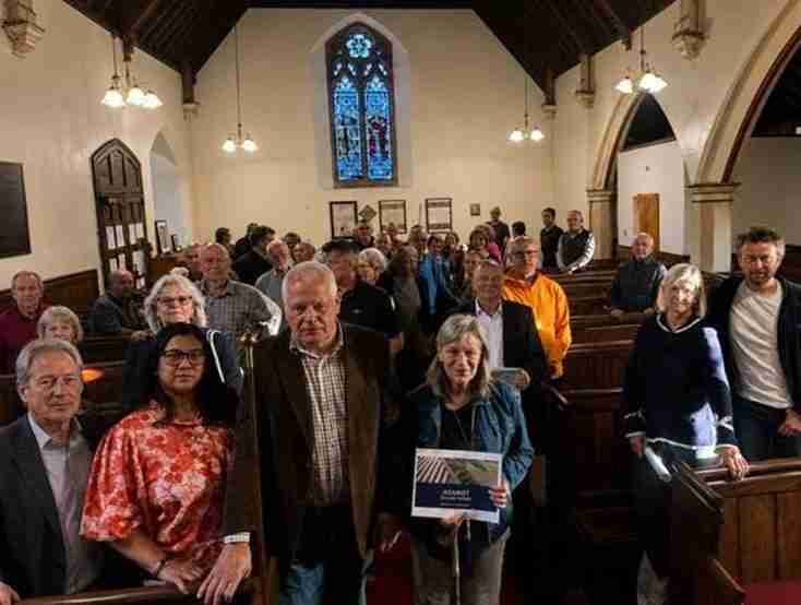 Group of people gathered inside church