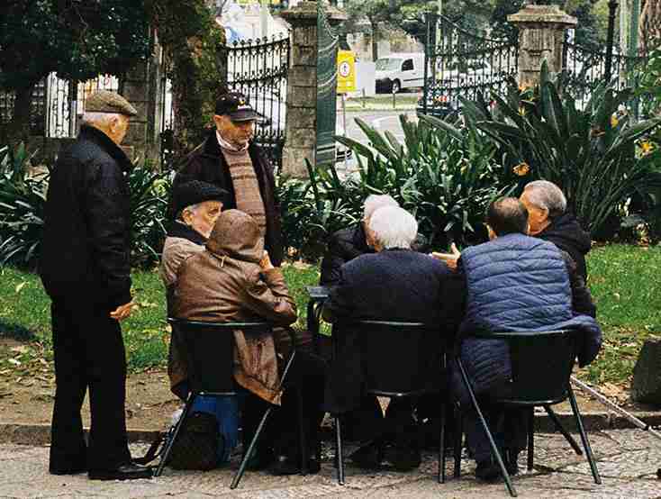 Group of elderly people sitting outdoors