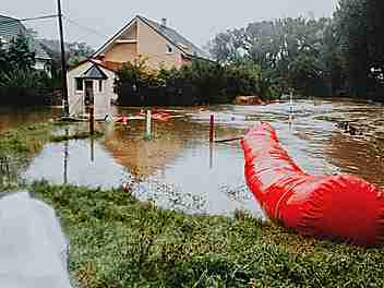 Waterlogged land highlighting local flood risk concerns